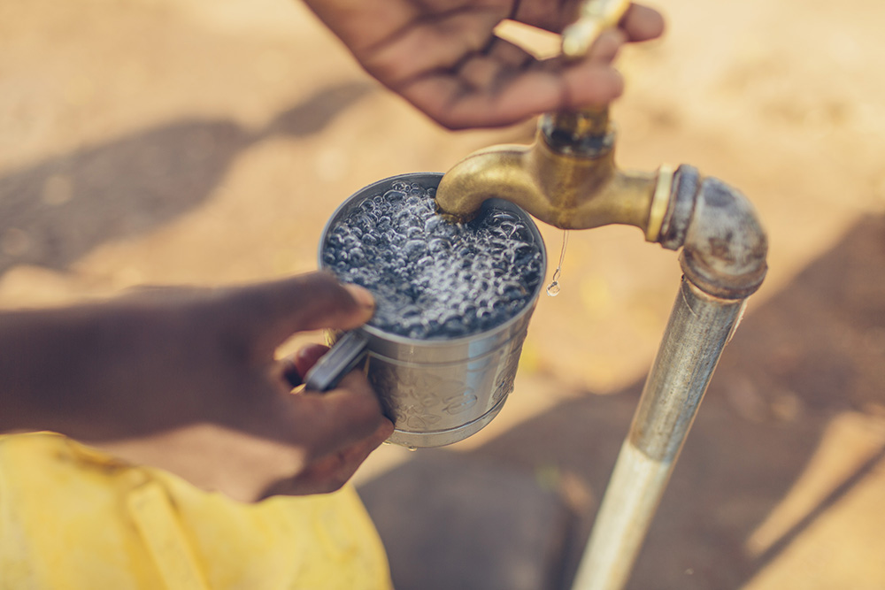 Water Mission installed a safe water treatment system at Dina's school in Malawi.